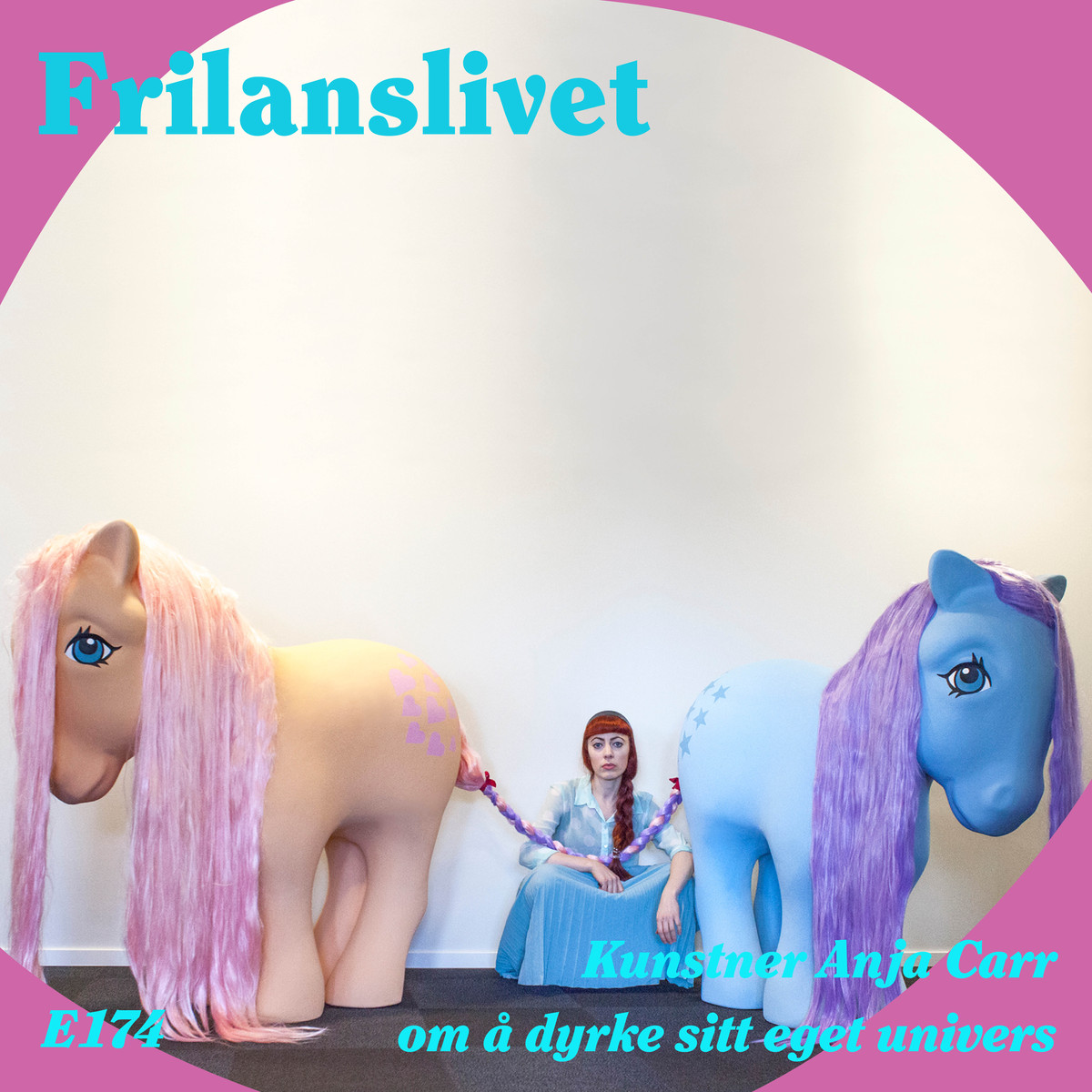 Picture of artist Anja Carr, sitting on the floor between two of her own sculptures. The sculptures take shape and color after My Little Pony. One in blue and one in peach colour. The text says "Artist Anja Carr, about cultivating her own universe".